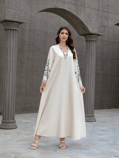 Robe musulmane élégante pour femmes – Abaya à col en V, jupe longue avec franges, style Moyen-Orient, look raffiné