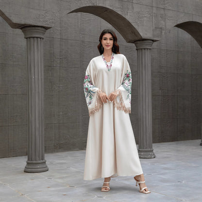 Robe musulmane élégante pour femmes – Abaya à col en V, jupe longue avec franges, style Moyen-Orient, look raffiné