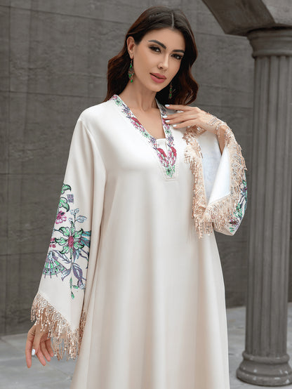 Robe musulmane élégante pour femmes – Abaya à col en V, jupe longue avec franges, style Moyen-Orient, look raffiné